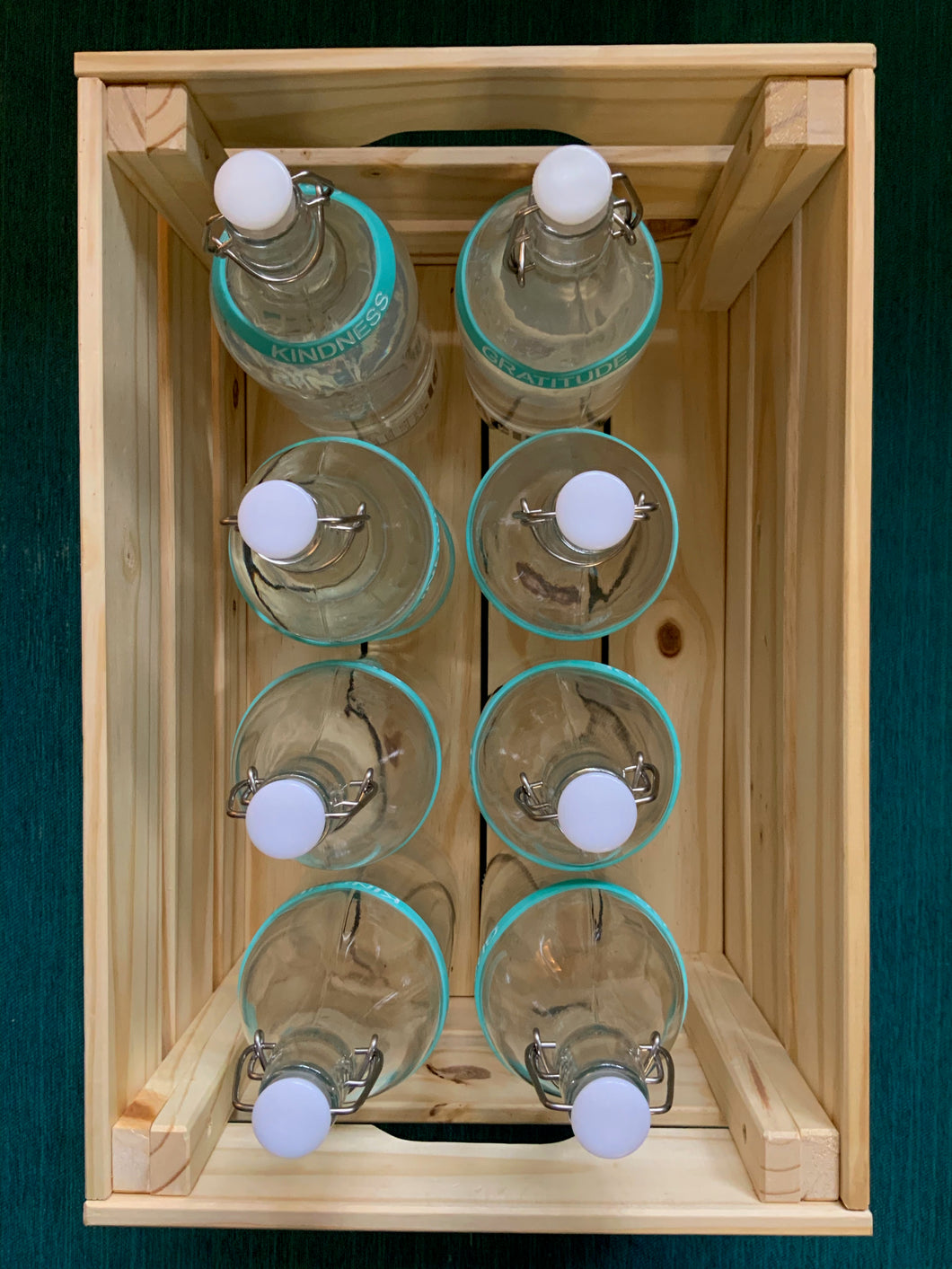 Refill with returned 8 x 32 oz. bottles and wooden crate = $50